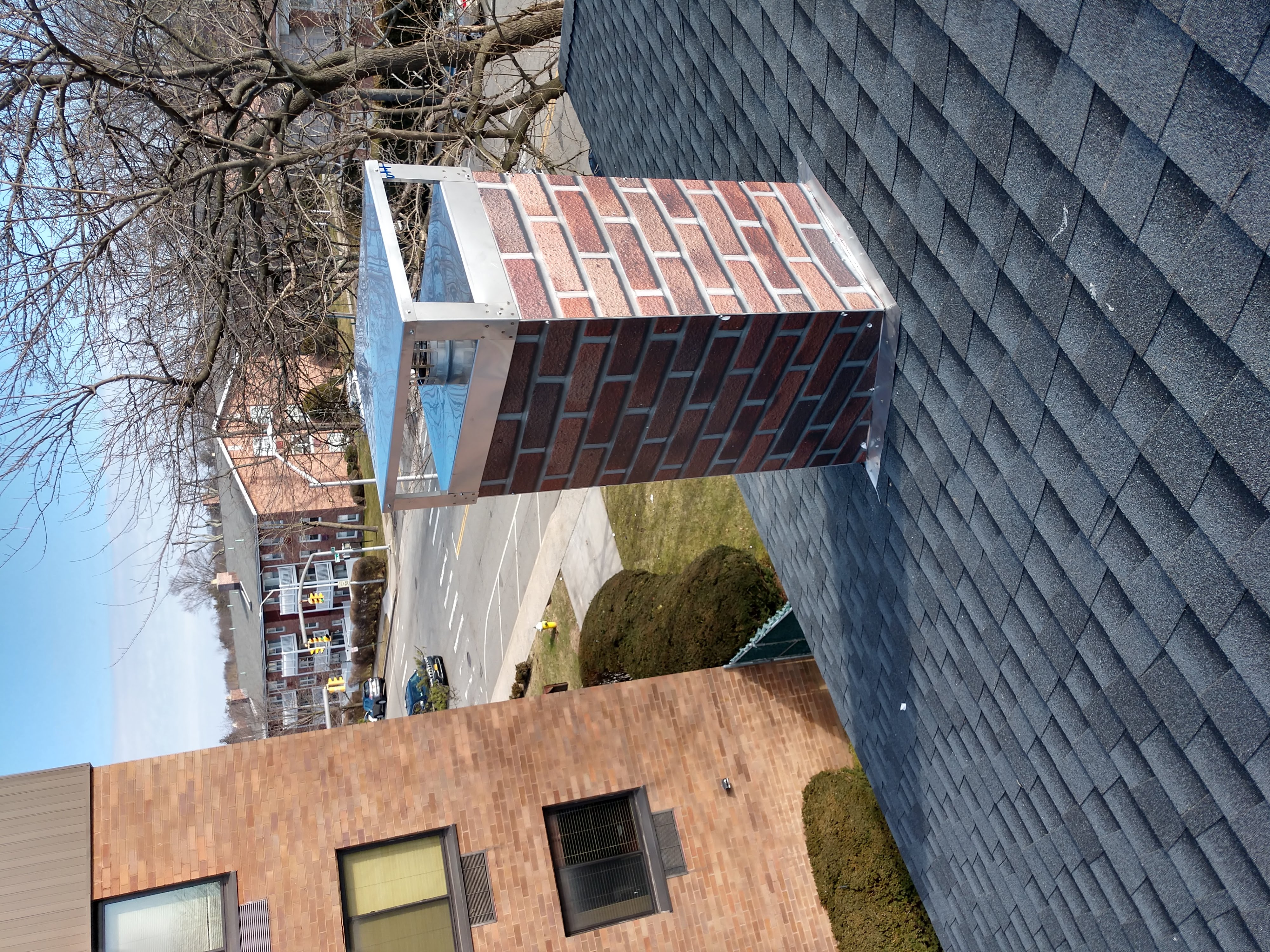New elastomeric sealant applied to chimney crown in East Hampton, NY