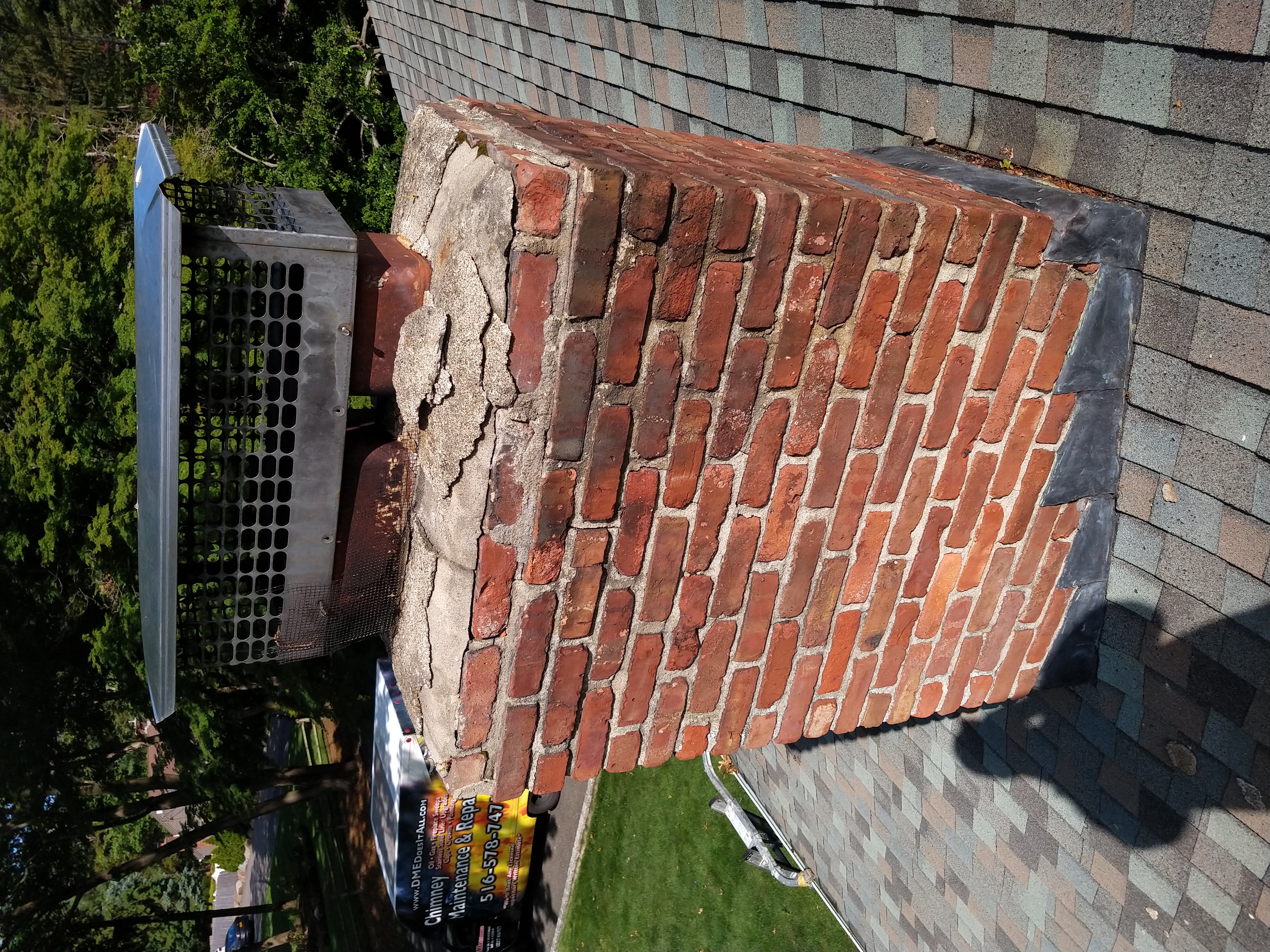 Cracked chimney crown professionally repaired in East Hampton, New York